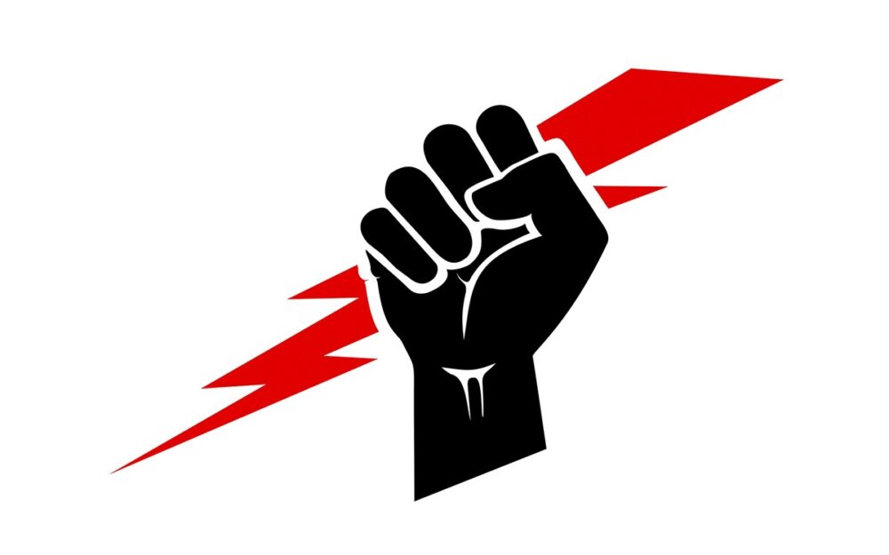 An illustration of a fist holding a red lightning bolt